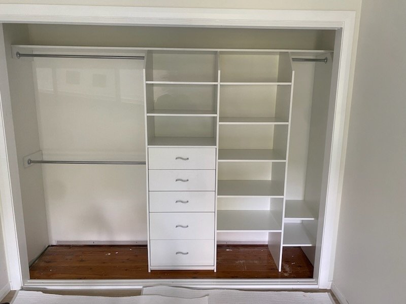 Wardrobe internals with additional shelving