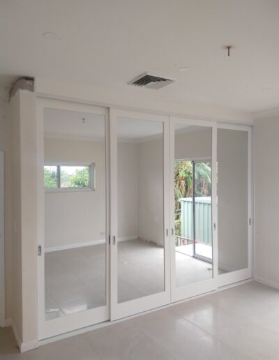 Wideline sliding doors with Mirror Inserts